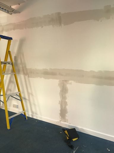 Installation of stud wall to form Archive Room